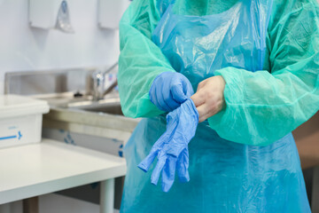 Researcher preparing for laboratory work